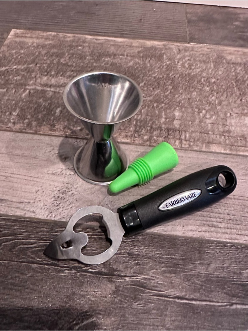 Farberware Black Handle Bottle Opener with Silver Jigger and Green Wine Stopper